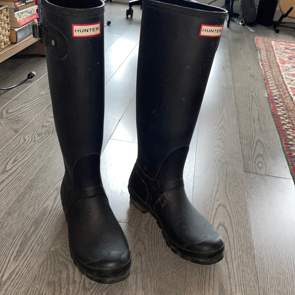 Matte black Hunter boots. Gently worn- broken buckle on 1 boot